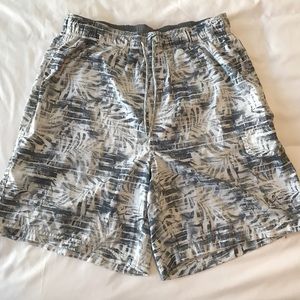 Grey and white palm print board shorts. Large